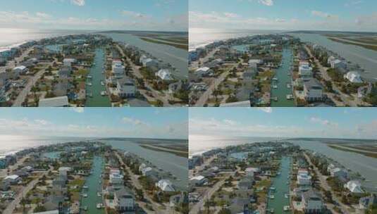 航拍有船和码头的海滨小镇高清在线视频素材下载