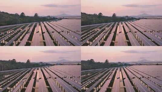 夕阳下太阳能光伏发电站航拍高清在线视频素材下载