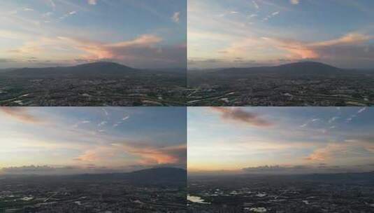 夕阳日落远处高山唯美云层航拍镜头4K高清在线视频素材下载