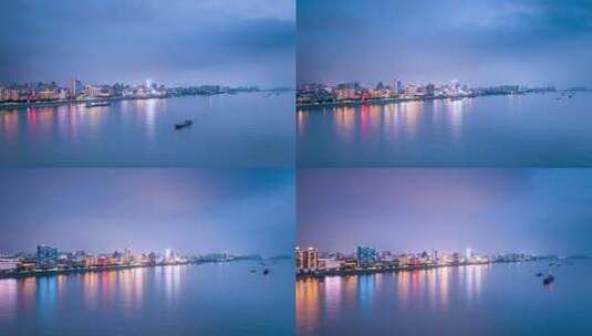 江畔城市江西九江雨后夜景航拍延时高清在线视频素材下载