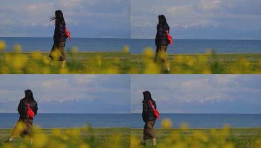 新疆赛里木湖边行走的女生背影高清在线视频素材下载