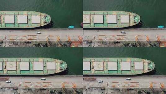 集装箱货运船在地标桑托斯港。高清在线视频素材下载