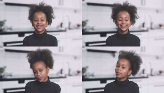 模糊背景下美丽非洲女孩的肖像女孩视频博主说话大笑高清在线视频素材下载