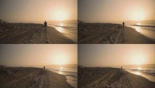 黄昏海边沙滩上跑步高清在线视频素材下载