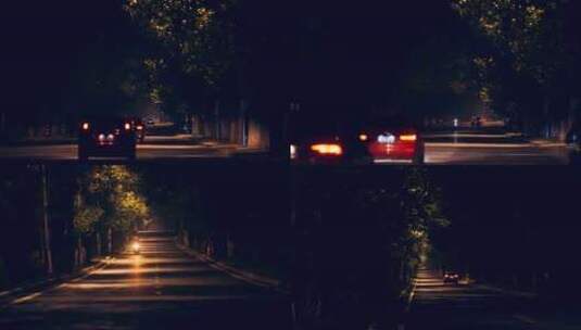 4K深夜马路街头公路路灯暖光车辆行驶高清在线视频素材下载