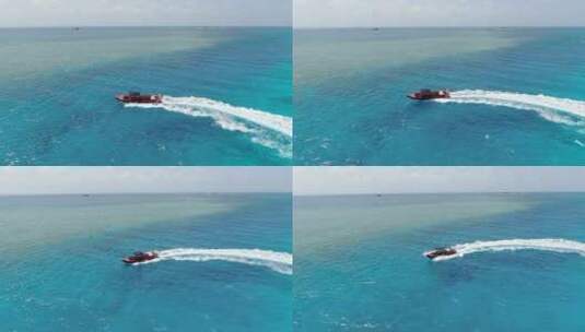 西沙群岛南海岛礁小船航拍高清在线视频素材下载