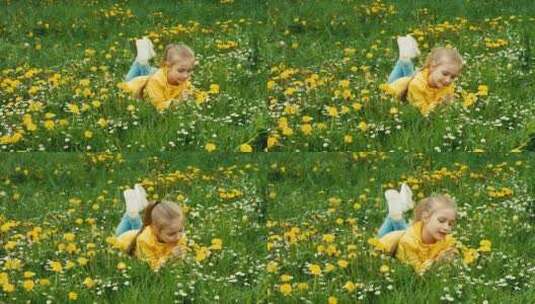 躺在黄花丛中的女孩微笑着竖起大拇指高清在线视频素材下载