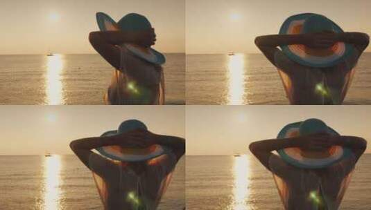 一个戴帽子的女人期待着海上黎明高清在线视频素材下载