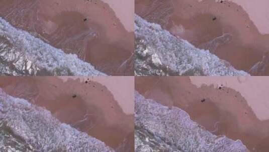 西冲海滩航拍顶视图人走动高清在线视频素材下载