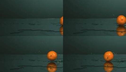 在水面上滚动的橘子高清在线视频素材下载