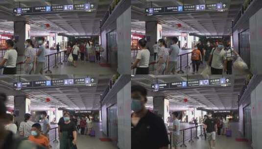 动车站出口人流地下通道车站地铁行人群旅客高清在线视频素材下载