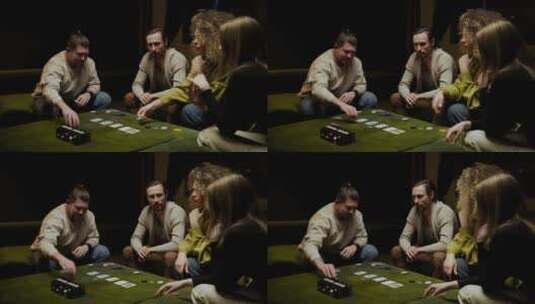 一群朋友在客厅玩扑克高清在线视频素材下载