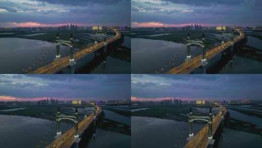 4K哈尔滨阳明滩大桥夜景航拍高清在线视频素材下载