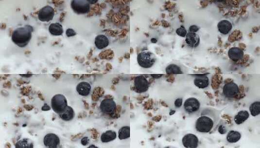 蓝莓坚果掉进牛奶高清在线视频素材下载