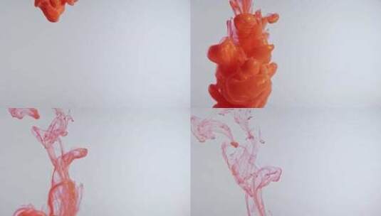 橙色珍珠色油漆在白色背景下滴在水中高清在线视频素材下载