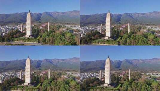 冬季云南大理古城崇圣寺三塔日出清晨航拍高清在线视频素材下载