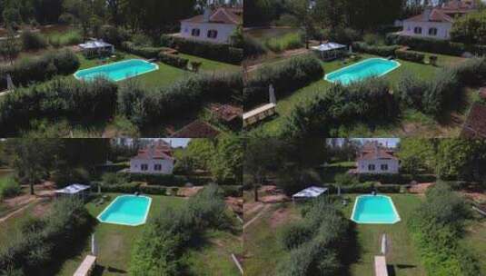 葡萄牙乡村庄园侧院内地面游泳池环绕室外的高清在线视频素材下载