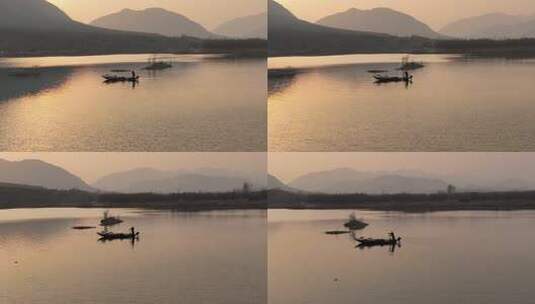 夕阳下湖面小船与人物剪影高清在线视频素材下载