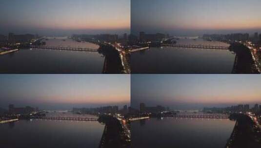 傍晚城市车流大桥河面降落高清在线视频素材下载