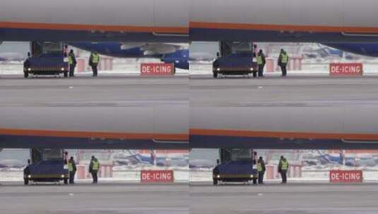 机组人员站在机场跑道上高清在线视频素材下载