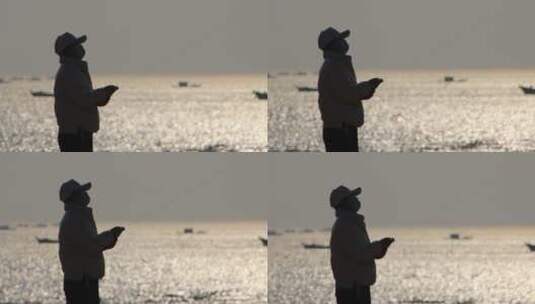 海边放风筝的女子高清在线视频素材下载