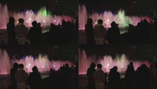 新年里观看音乐喷泉的市民热闹的晚上高清在线视频素材下载