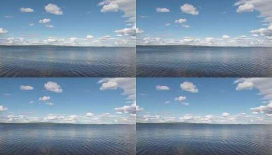 美丽的海景海天一色拍打海岸蓝天白云高清在线视频素材下载