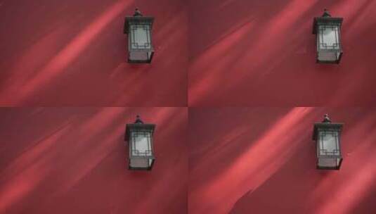 红墙壁灯树影高清在线视频素材下载