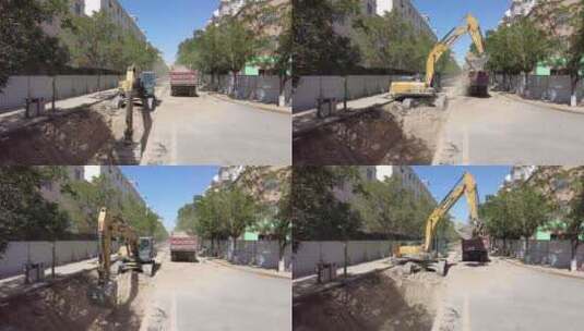 挖掘机在城市道路开挖管沟高清在线视频素材下载
