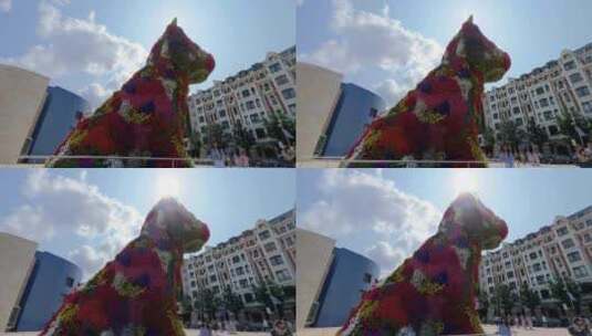 毕尔巴鄂由各种颜色花组成的狗雕塑高清在线视频素材下载