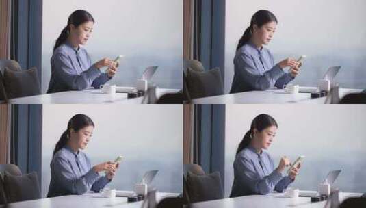 商务职业女性在办公室使用手机高清在线视频素材下载
