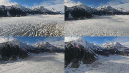 高耸山脉中的朱诺冰原塔库冰川上空的晴朗天高清在线视频素材下载