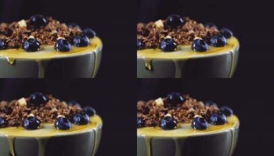 格兰诺拉麦片，碗，蓝莓，蜂蜜高清在线视频素材下载