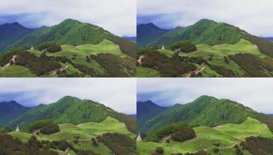 航拍四姑娘山大峰登山大本营夏季草原景色高清在线视频素材下载