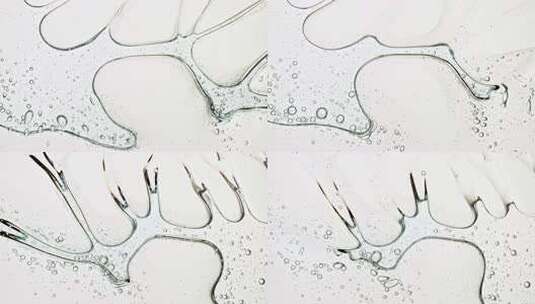 透明化妆品凝胶液与分子气泡油分布在白色背高清在线视频素材下载