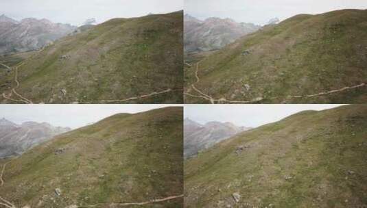 瑞士阿尔卑斯山草地的无人机鸟瞰图，山区自然景观，采尔马特高清在线视频素材下载