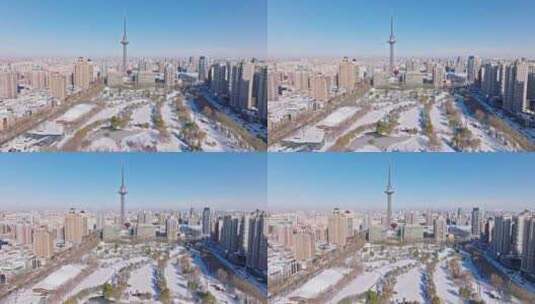 中国黑龙江哈尔滨龙塔城市雪景航拍高清在线视频素材下载