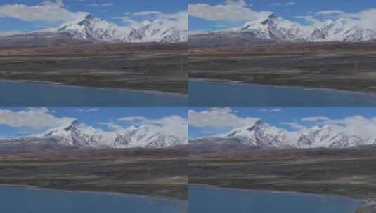 航拍西藏佩枯错和希夏邦马峰高清在线视频素材下载