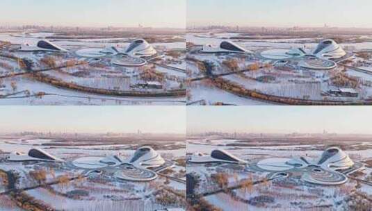 中国黑龙江哈尔滨大剧院雪景航拍高清在线视频素材下载