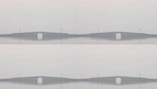 杭州西湖白堤初冬晨雾雾霾空镜高清在线视频素材下载