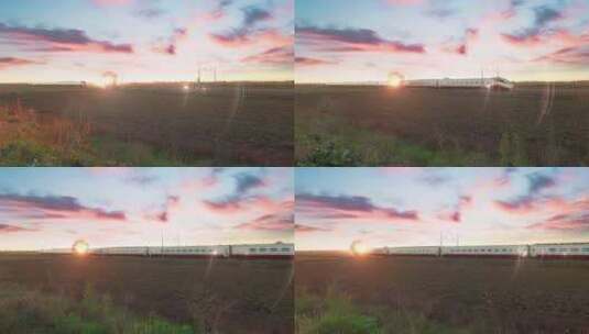 白色和红色的高速列车在美丽的日落天空中行高清在线视频素材下载