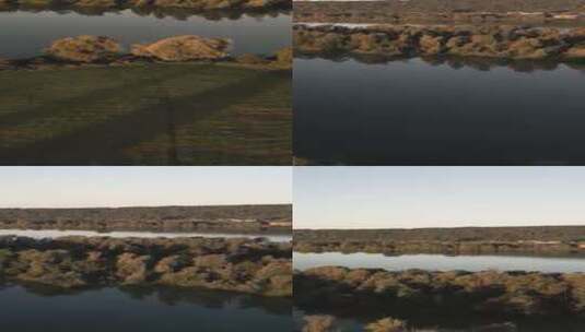 航拍日落时分波光粼粼的湖面森林夕阳高清在线视频素材下载