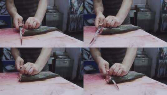 厨师在切割鱼肉高清在线视频素材下载