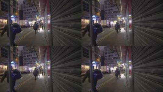 沿着香港人行道向后的追踪镜头高清在线视频素材下载