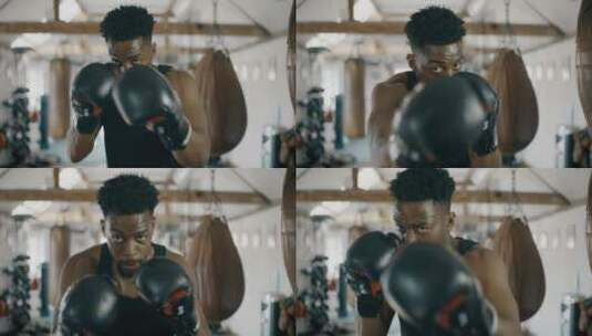 健身房的黑人用拳击手冲向相机高清在线视频素材下载