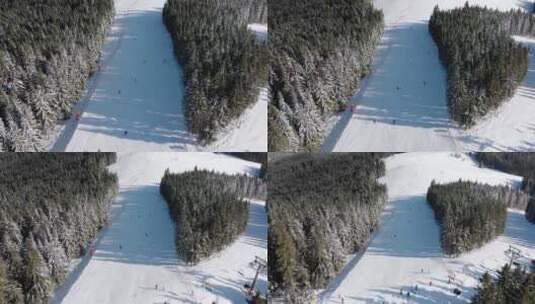 滑雪者下山的鸟瞰高清在线视频素材下载