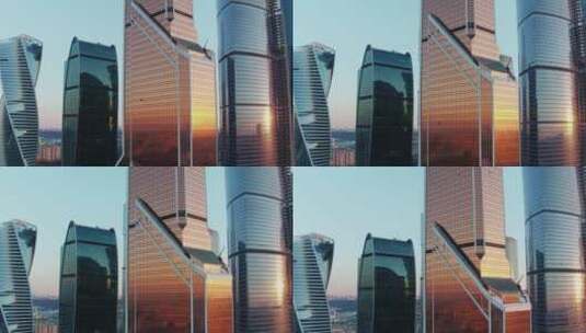 落日倒映在摩天大楼的窗户上高清在线视频素材下载