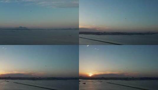 航拍夕阳飞机掠过天空海天相接高清在线视频素材下载