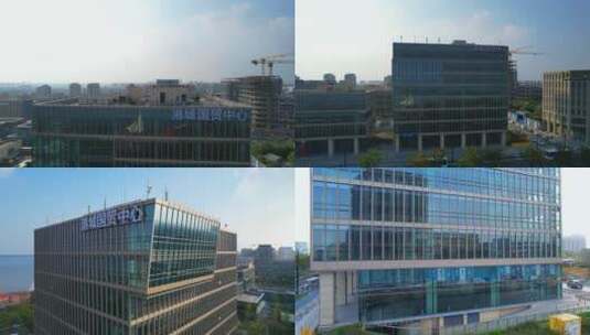 航拍上海临港新城港城国贸中心大楼高清在线视频素材下载