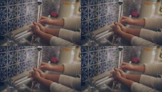 女孩在厨房洗手高清在线视频素材下载